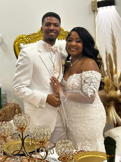 Pure Ivory Notch Tuxedo worn by a Tuxedo Club customer