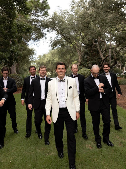 Pure Ivory Waverly Tuxedo worn by a Tuxedo Club customer