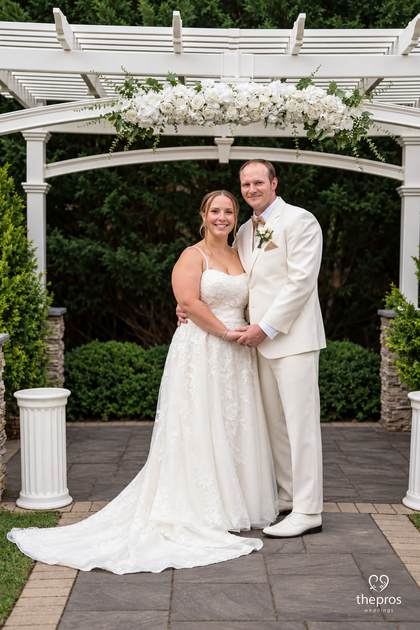 Pure Ivory Notch Tuxedo worn by a Tuxedo Club customer